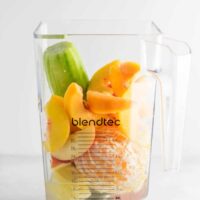 Ginger peach detox smoothie recipe with fresh cucumber and lemon. Packed full of healthy ingredients, naturally vegan, and so refreshing! #healthysmoothie #detoxsmoothie #gingerpeachsmoothie #vegan #smoothierecipes