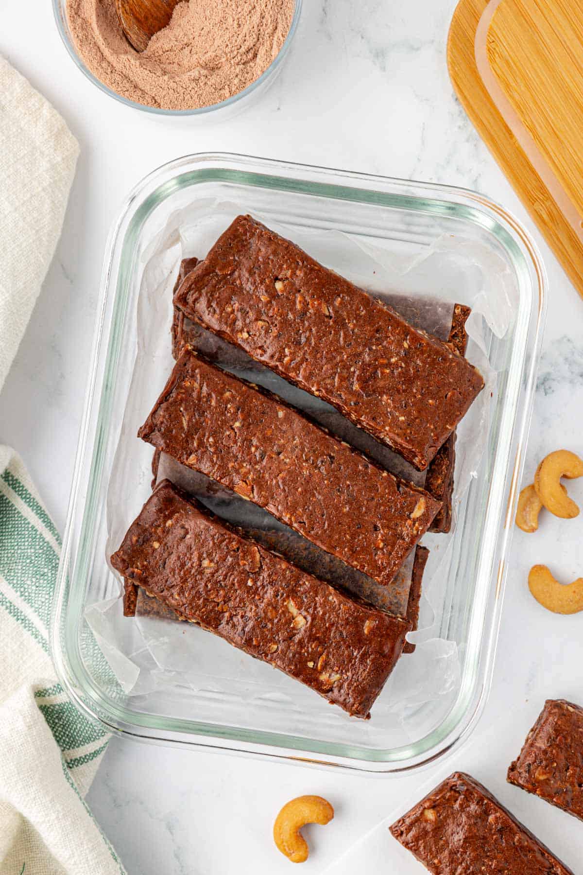 chocolate cashew protein bars in a storage container