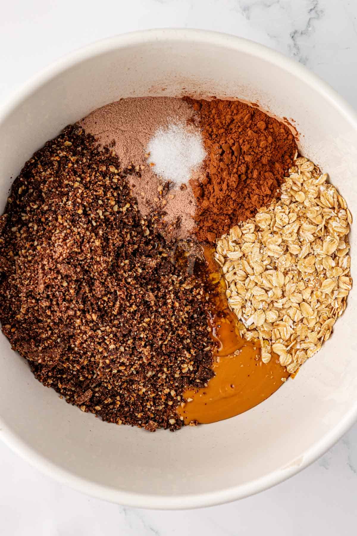 protein bar ingredients in a mixing bowl