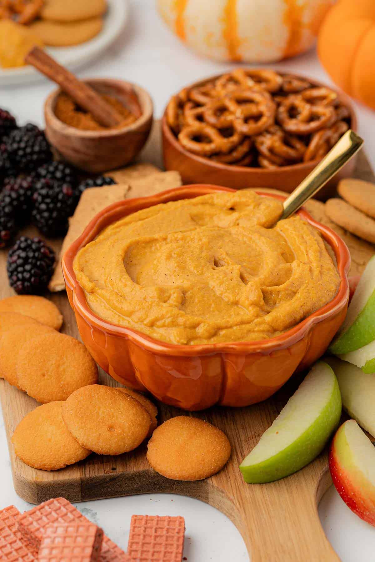 bowl filled with pumpkin cream cheese dip