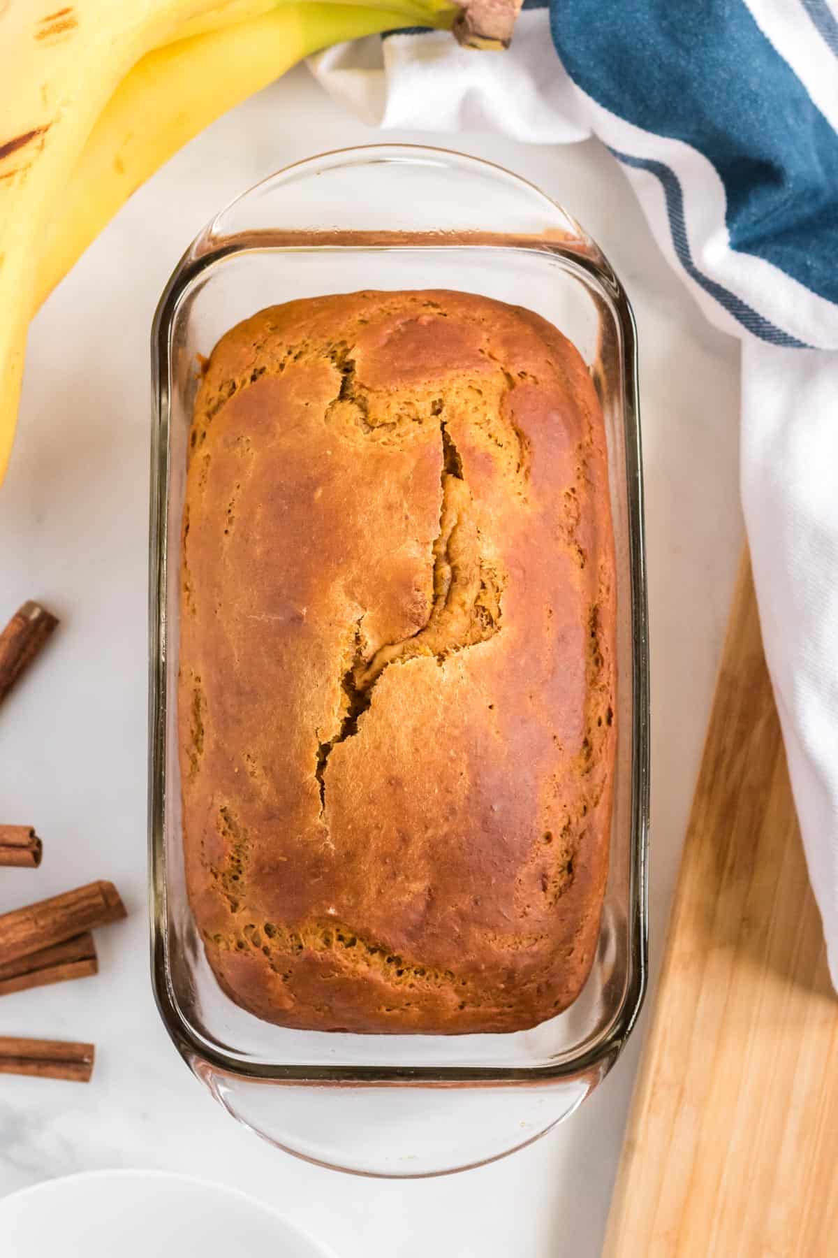 baked pumpkin banana bread in the loaf pan