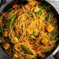 noodle tofu stir fry in a skillet