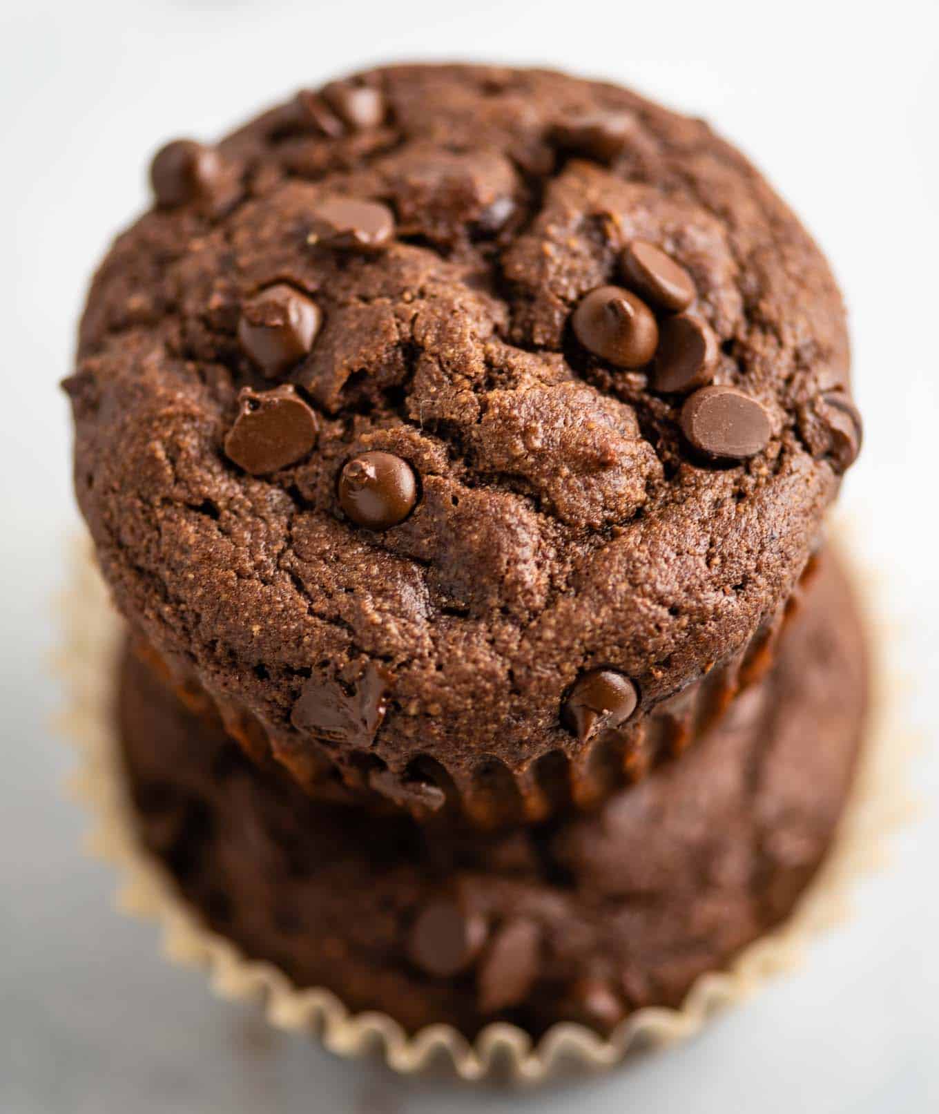 two stacked chocolate muffins