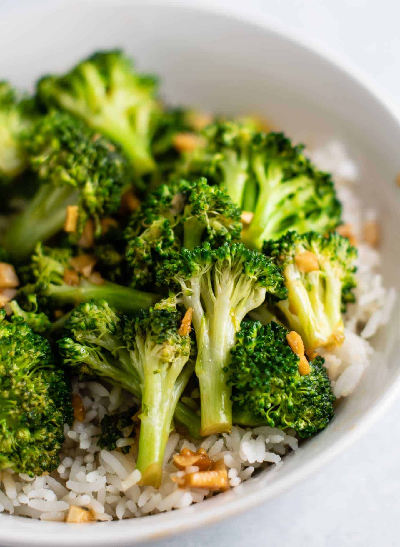 broccoli over rice in a white bowl