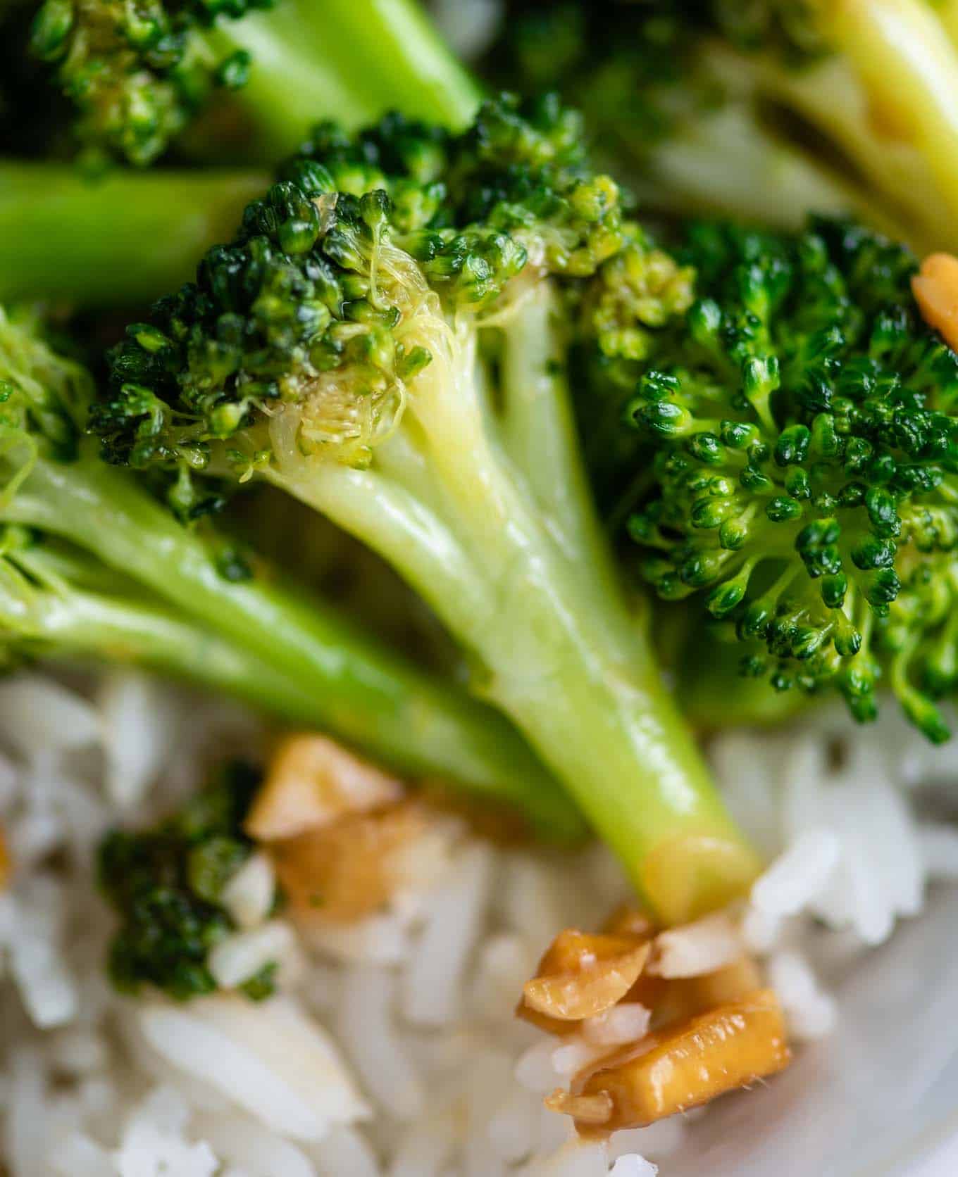 broccoli floret and minced ginger up close