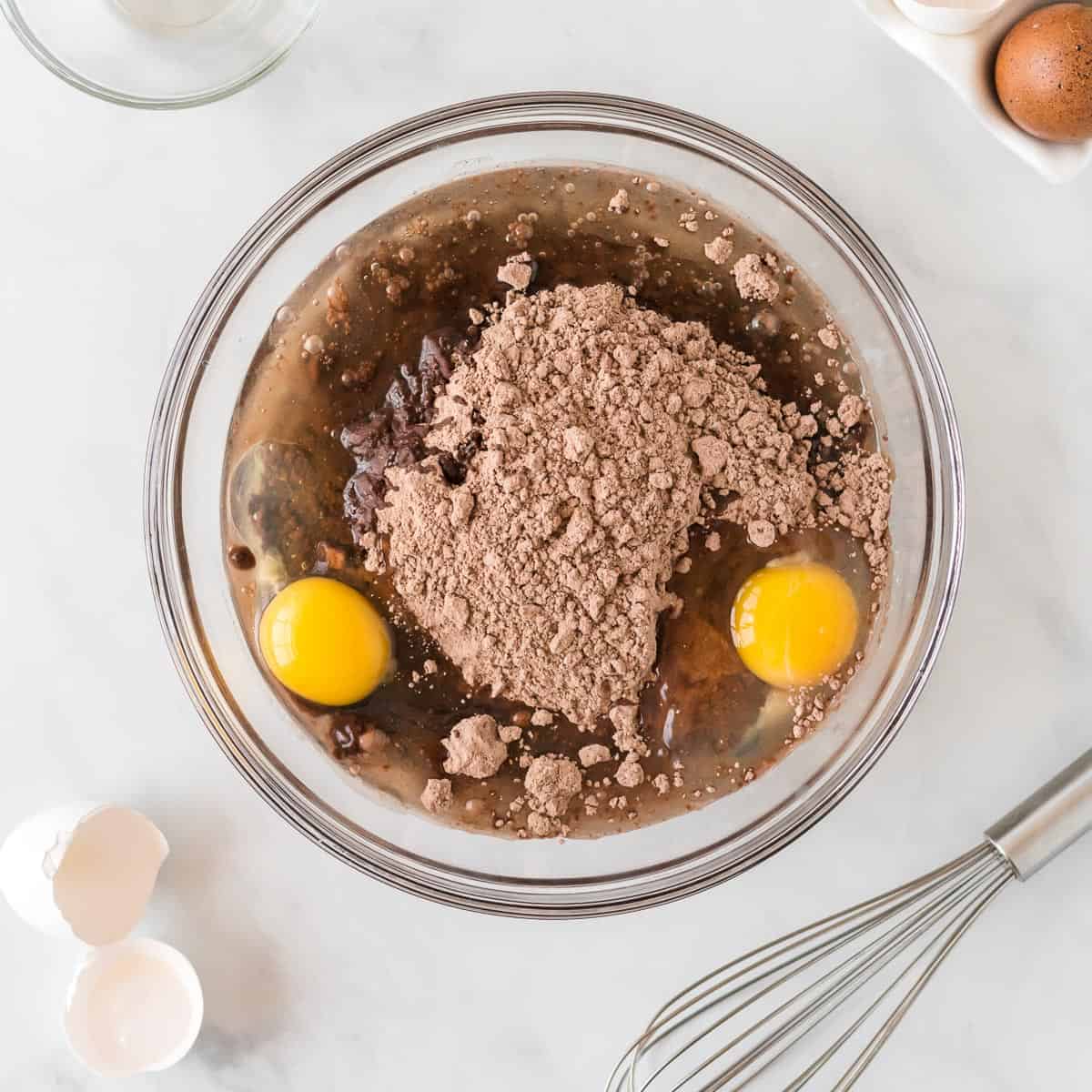 cake mix, oil, and eggs in a bowl