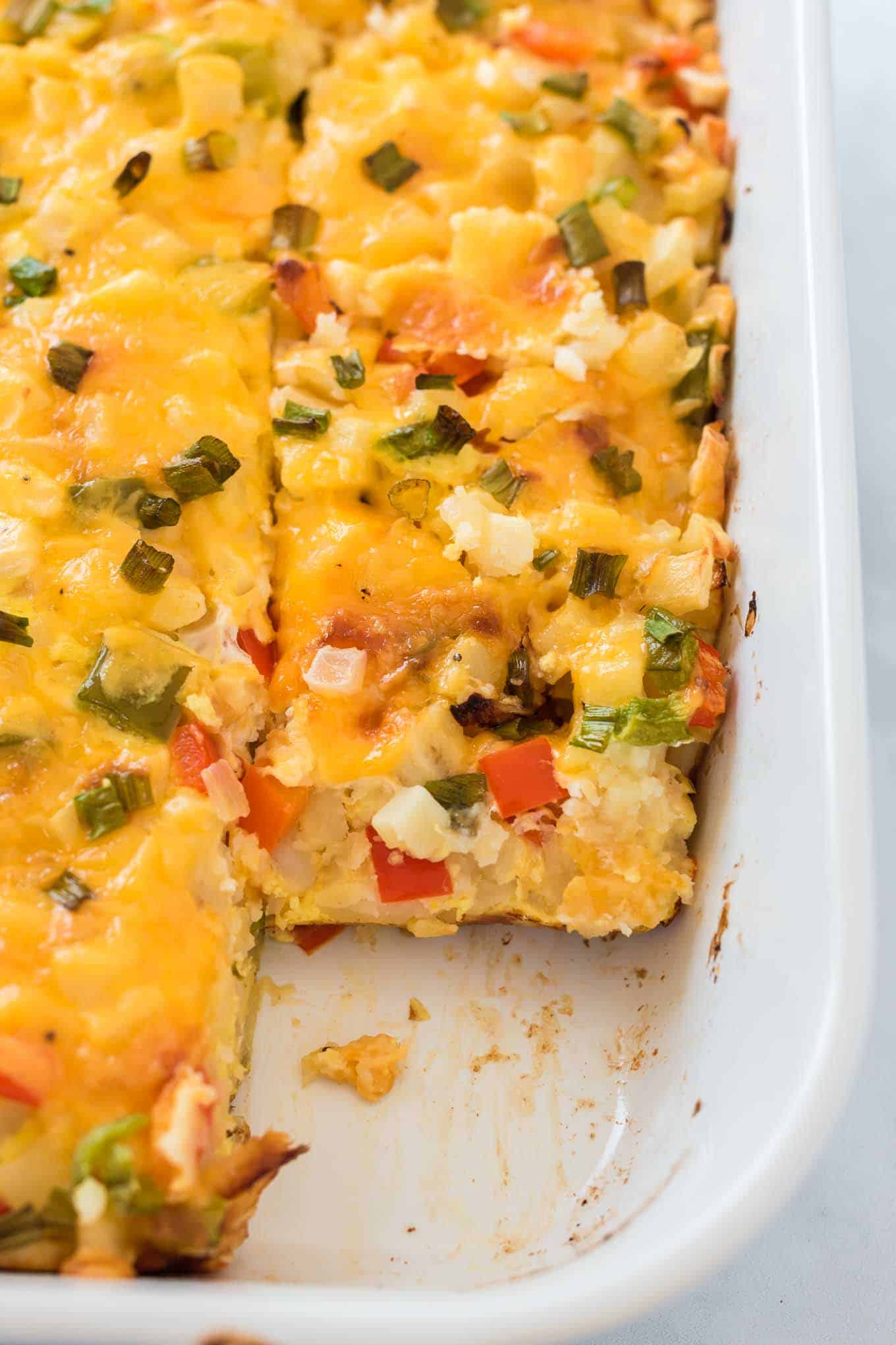 squares of egg casserole cut in the baking dish