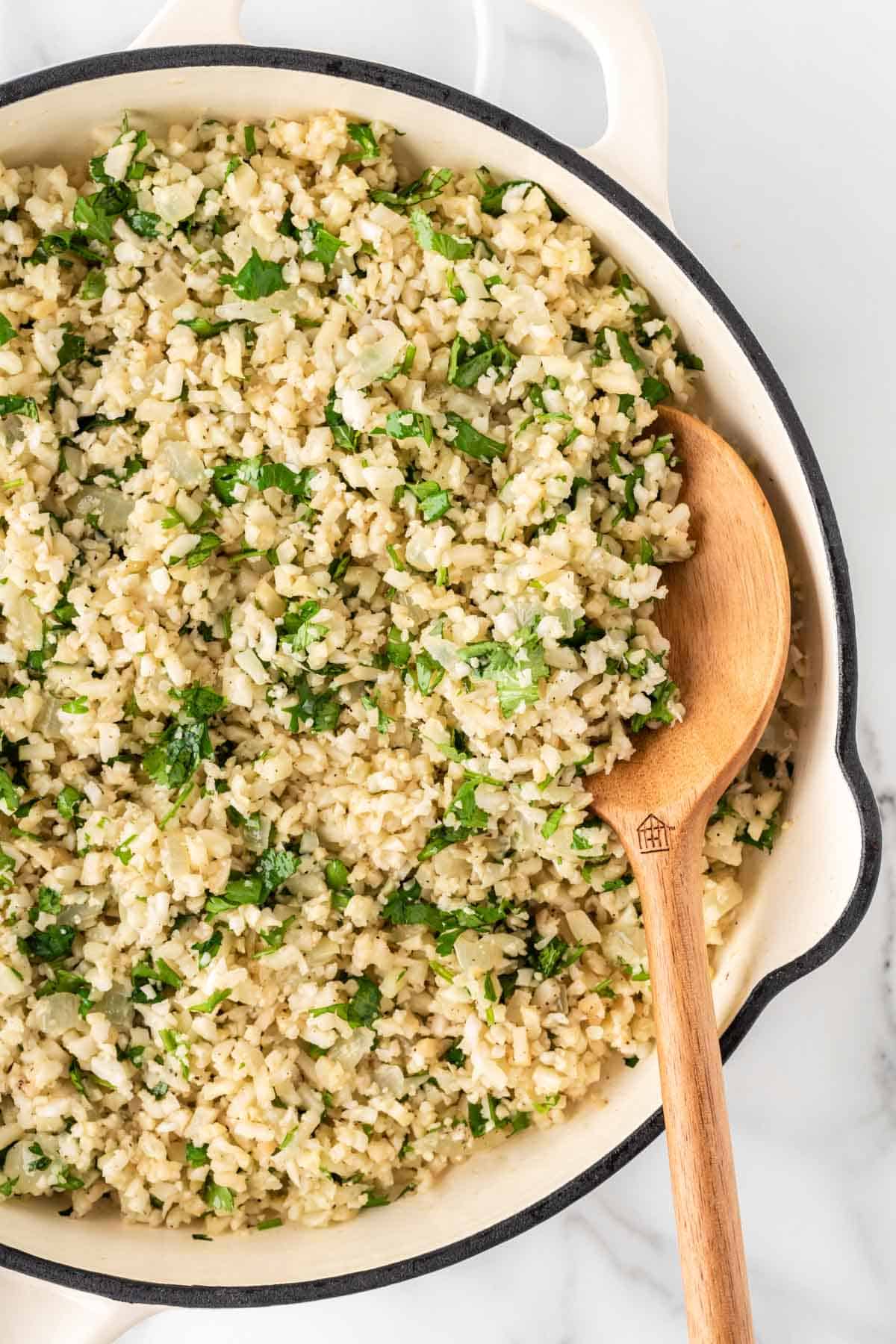 stirring the cauliflower rice
