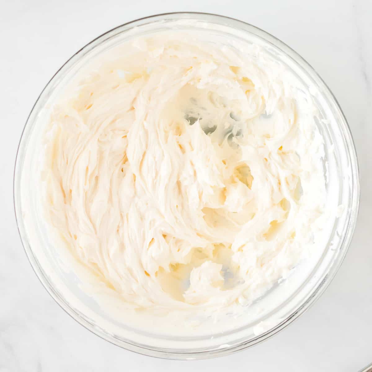 cream cheese beaten in a bowl