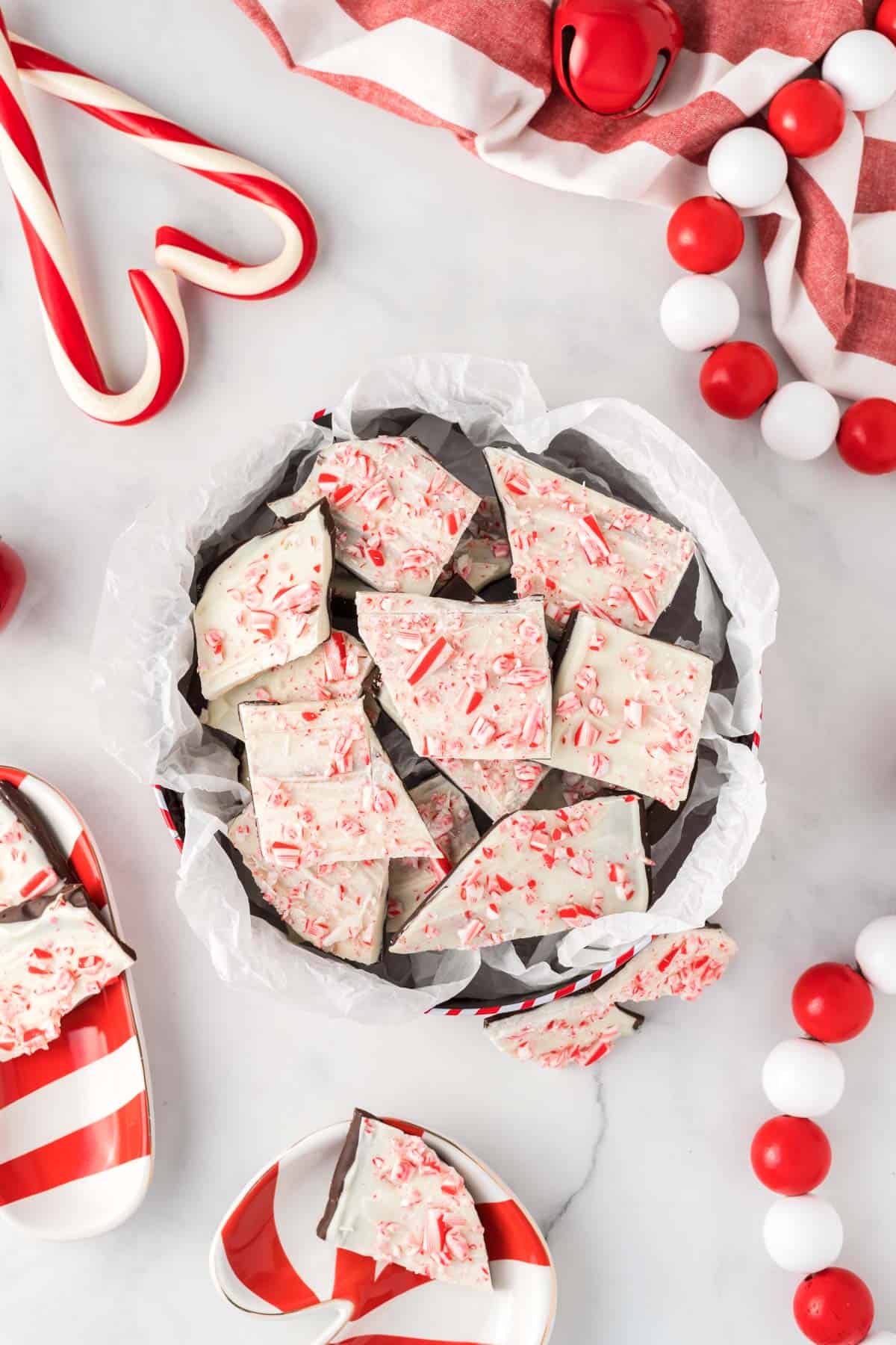 chocolate peppermint bark in a candy tin