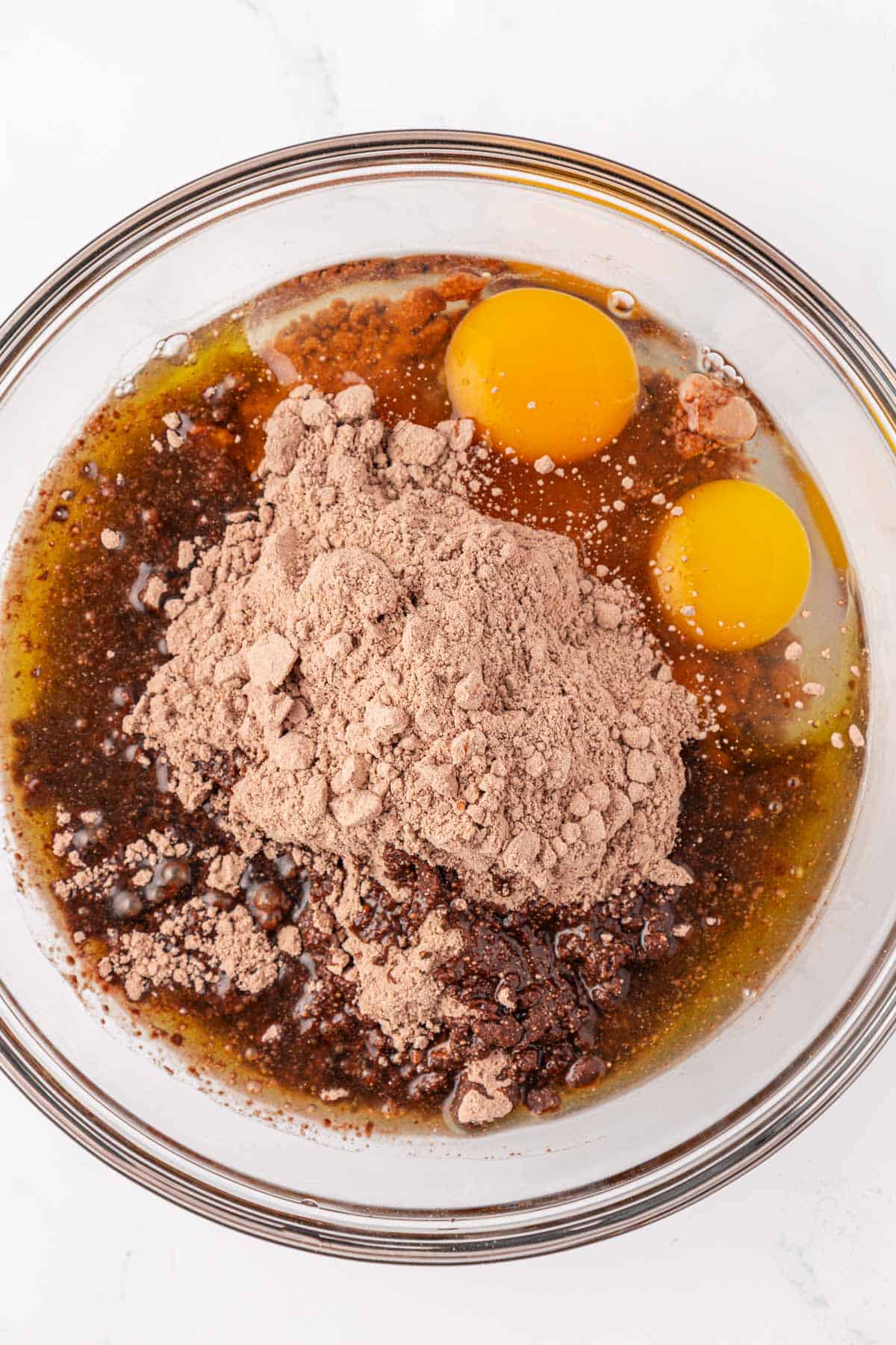 eggs, oil, and cake mix in a mixing bowl