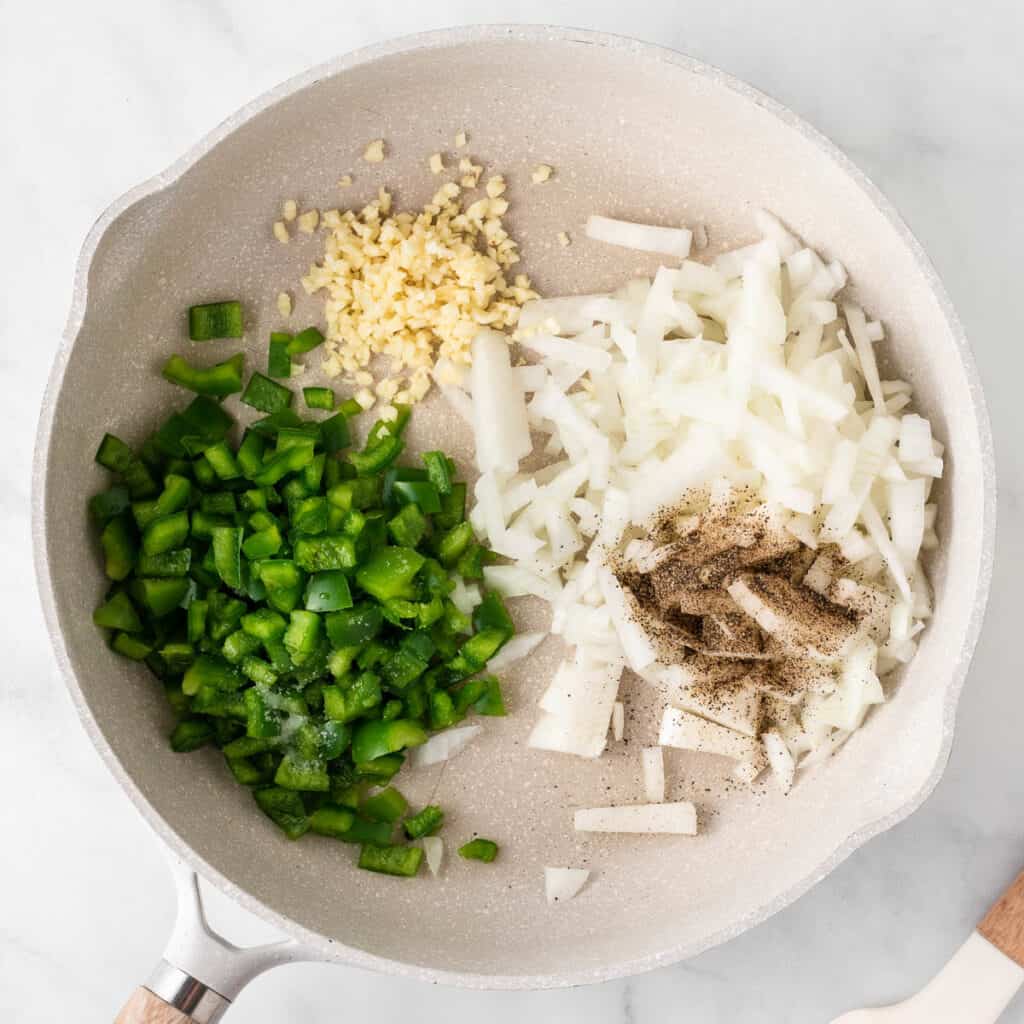 onion, garlic, and bell pepper in a skillet