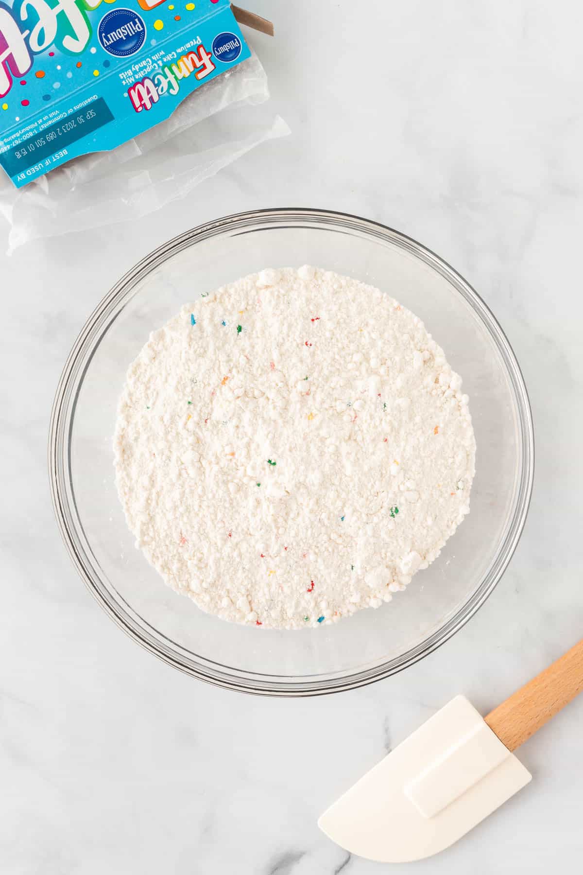 funfetti cake mix in a mixing bowl