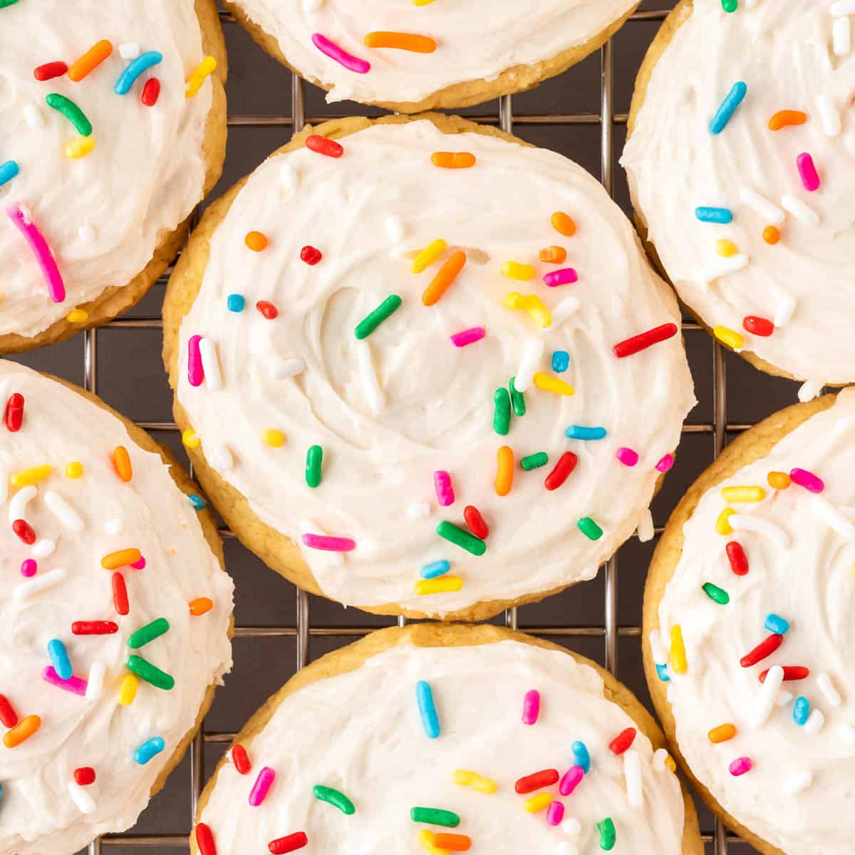 frosted sugar cookies with sprinkles