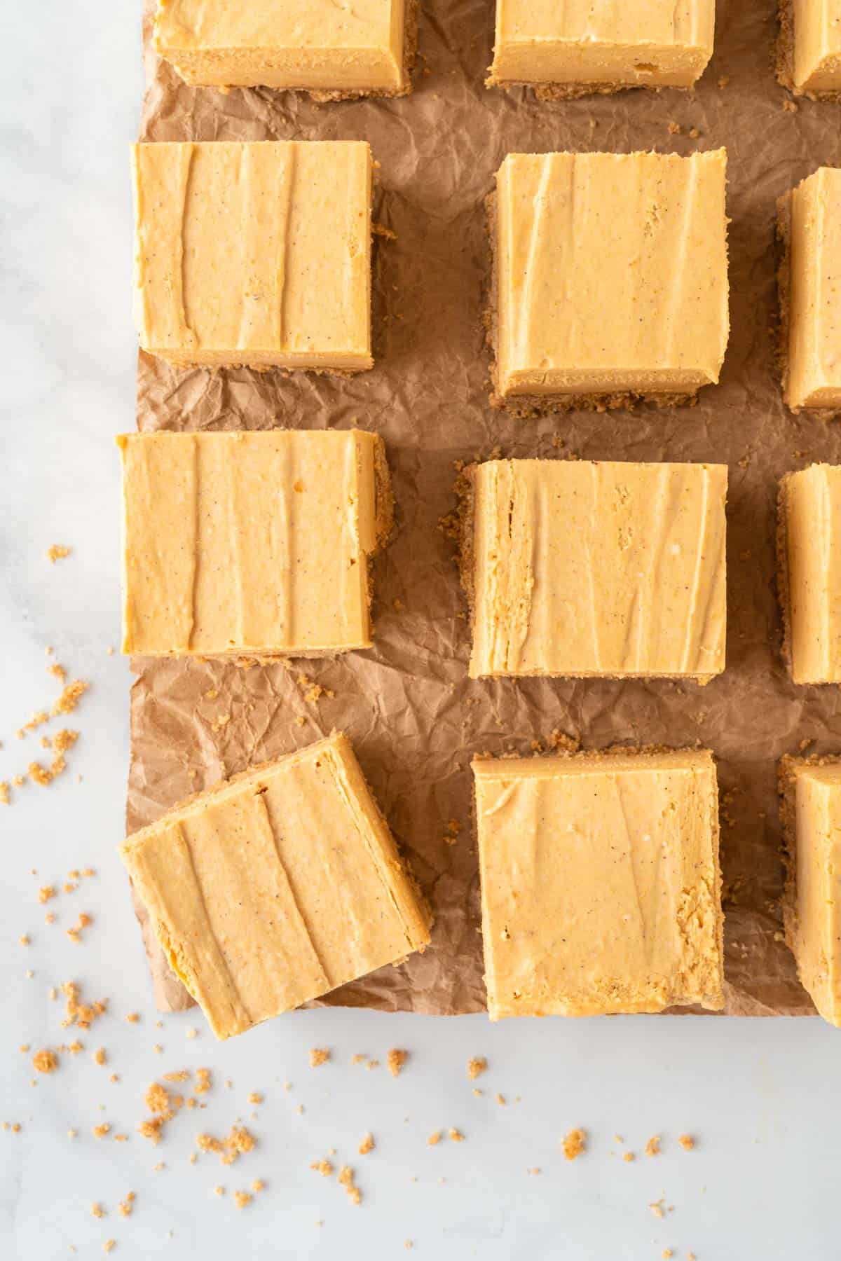 pumpkin cheesecake bars cut into squares