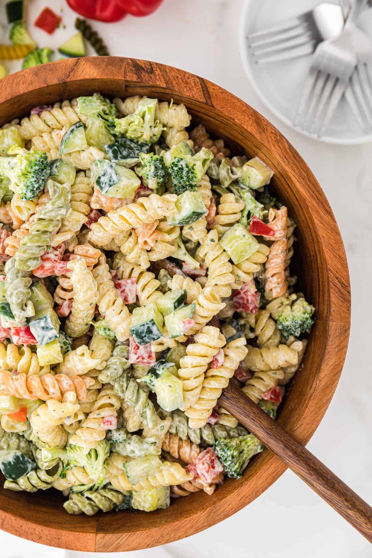 ranch pasta salad in a wooden serving bowl