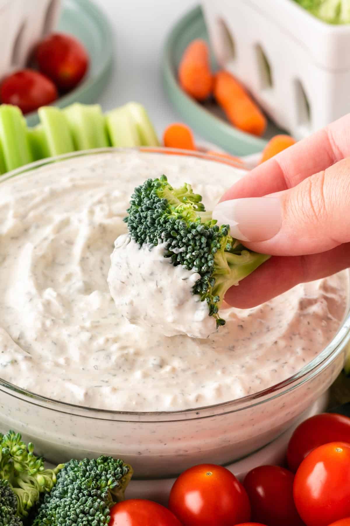 broccoli dipped into veggie dip