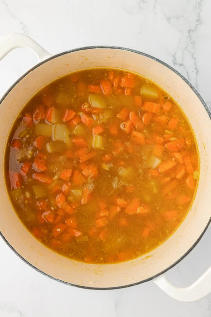 simmering vegetables in the soup