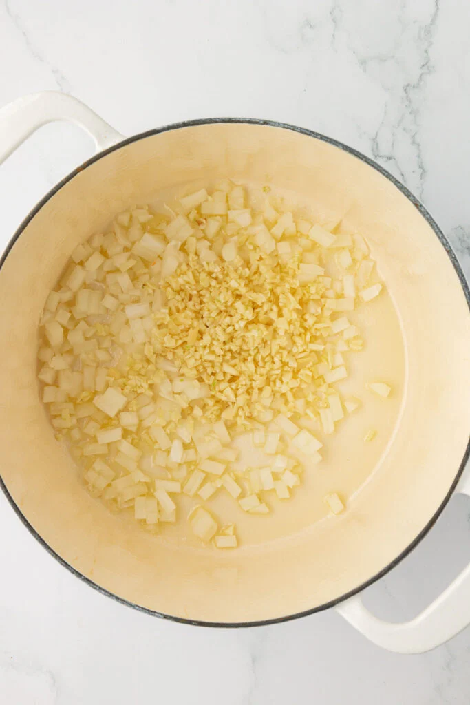 garlic and onion in a dutch oven