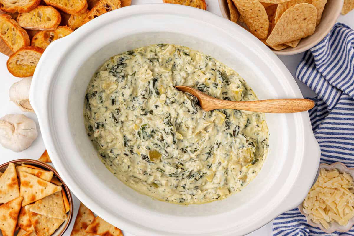 crock pot full of spinach artichoke dip