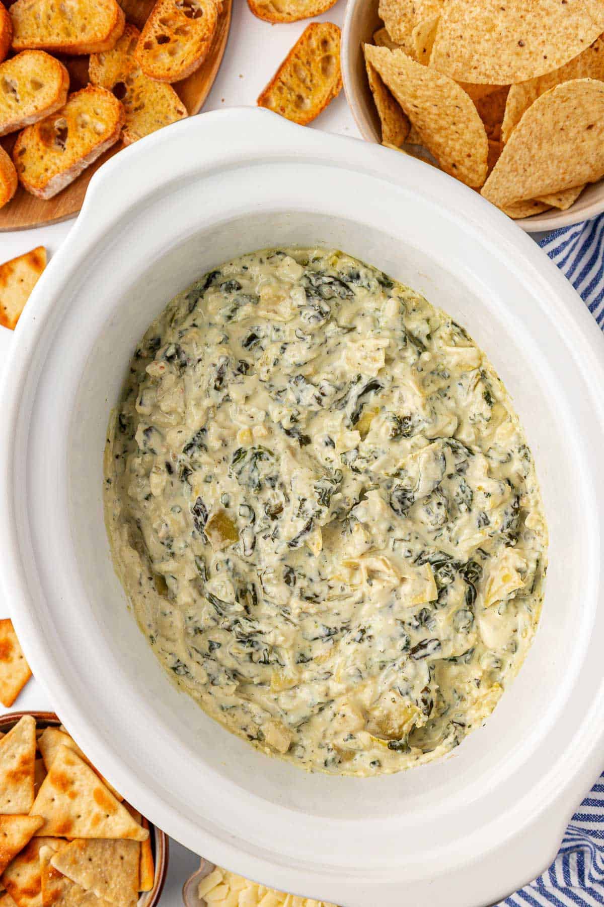 crock pot full of spinach artichoke dip