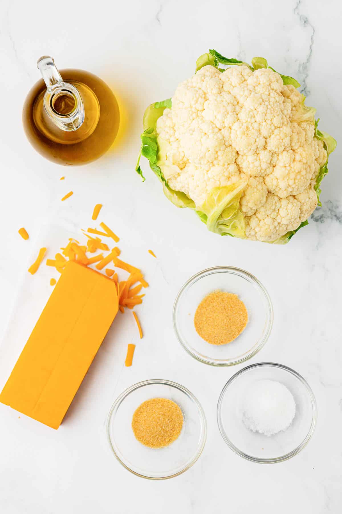 oil, cauliflower, spices, and cheddar cheese