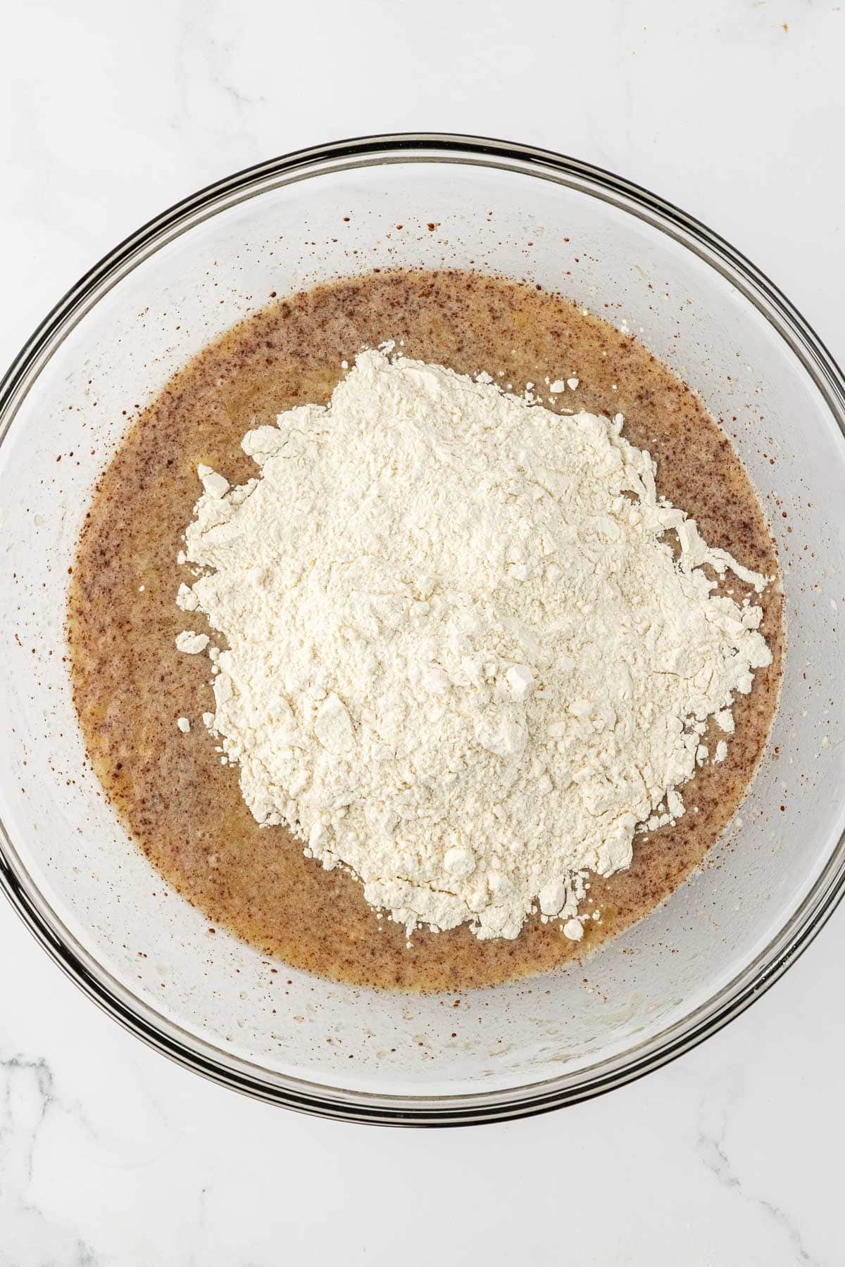 adding the dry ingredients to the wet ingredients