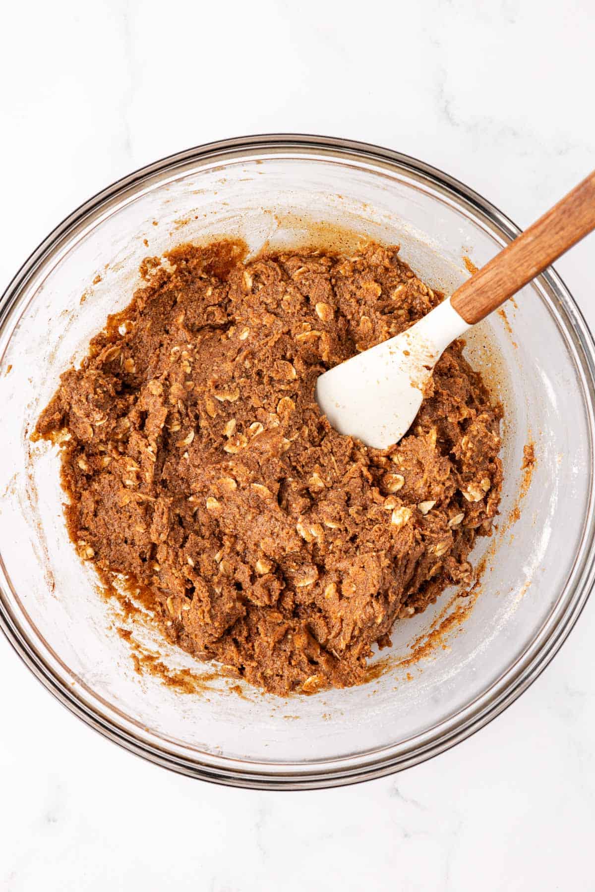 energy bite batter mixed together in a glass bowl