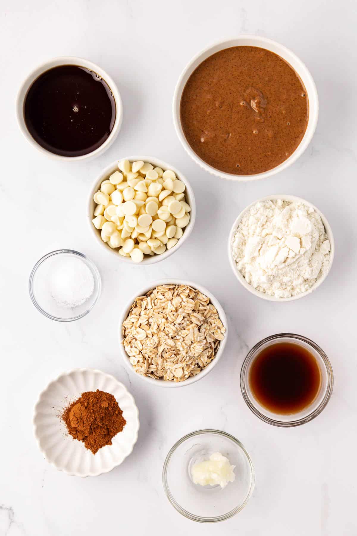 ingredients to make energy bites in individual bowls