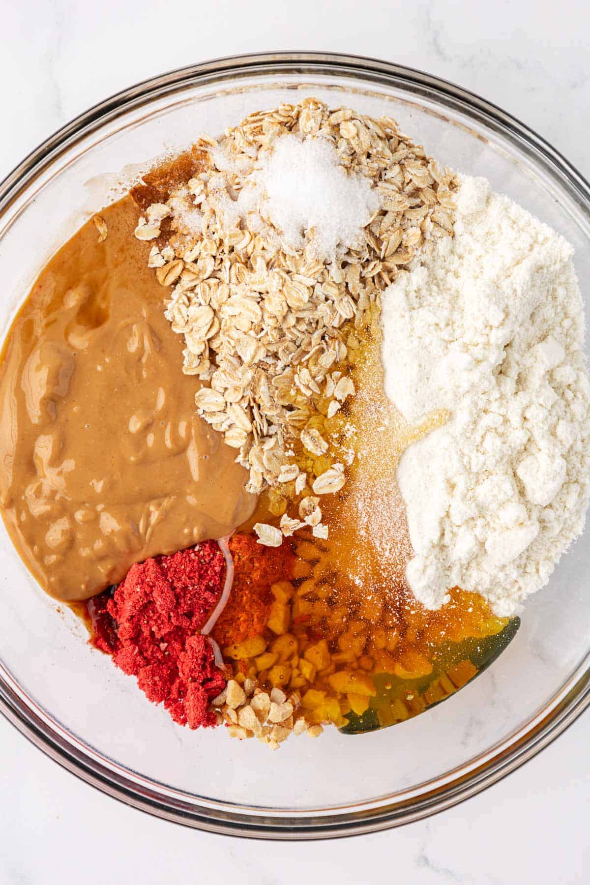 energy bite ingredients in a mixing bowl