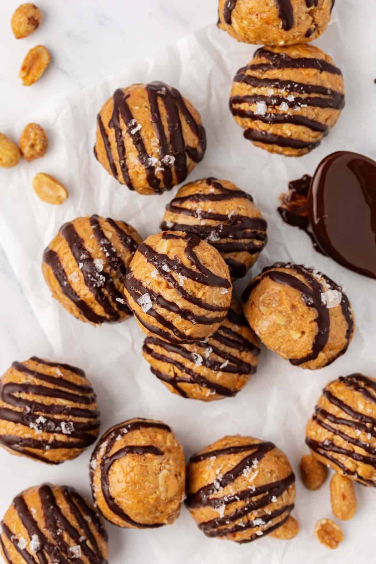 peanut butter energy bites drizzled with dark chocolate