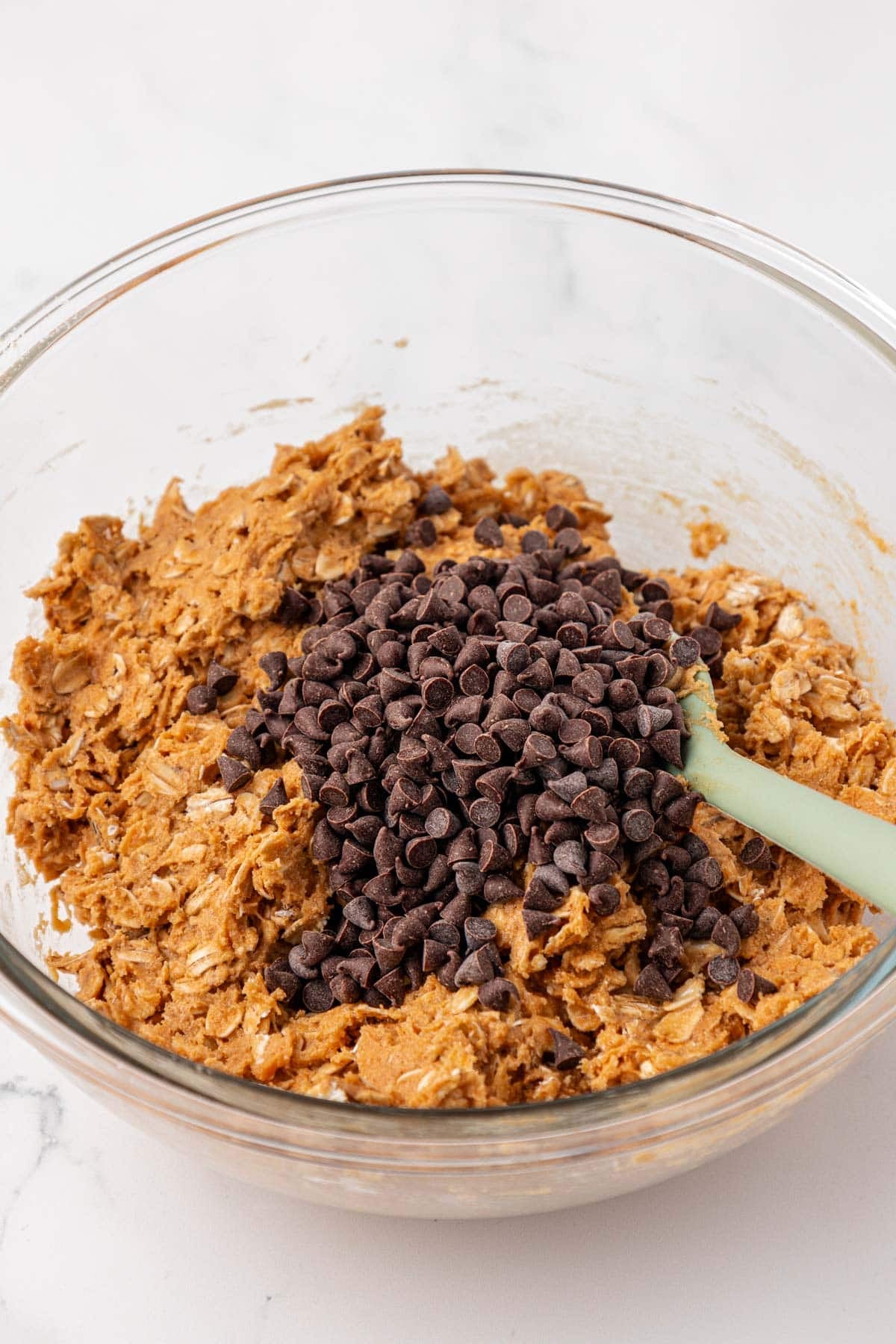 adding the mini chocolate chips to the batter