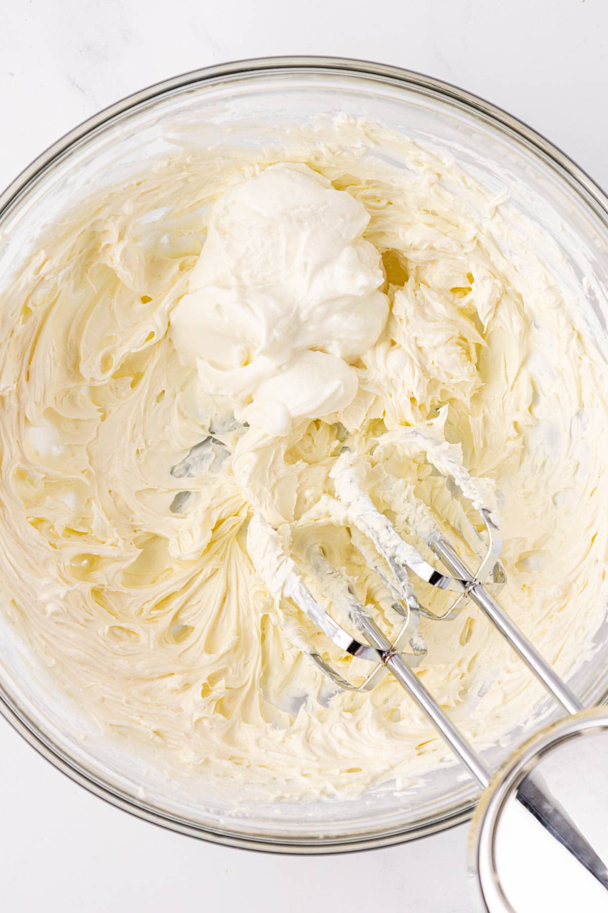 adding greek yogurt to whipped cream cheese