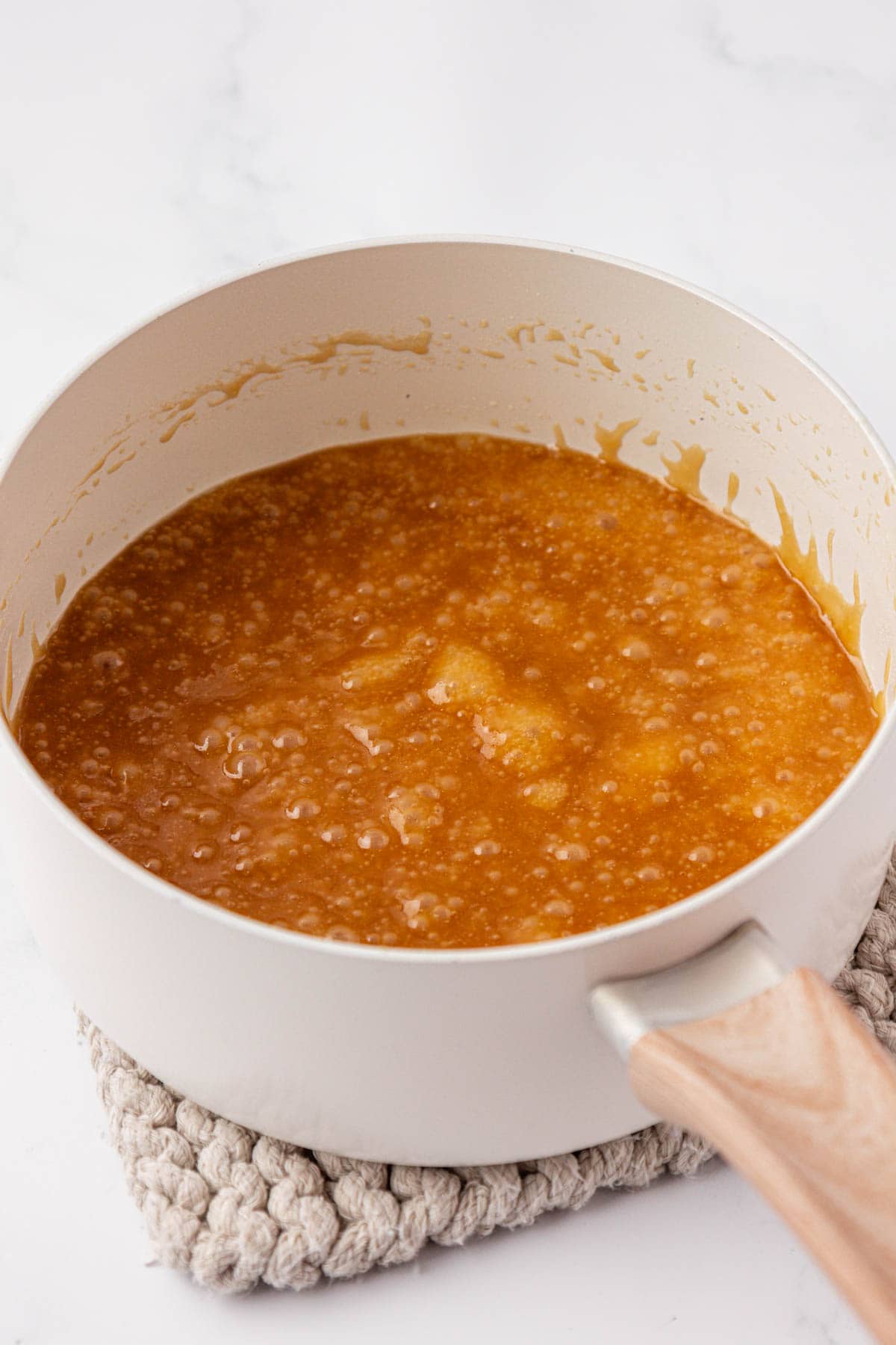 bubbling toffee in a sauce pan