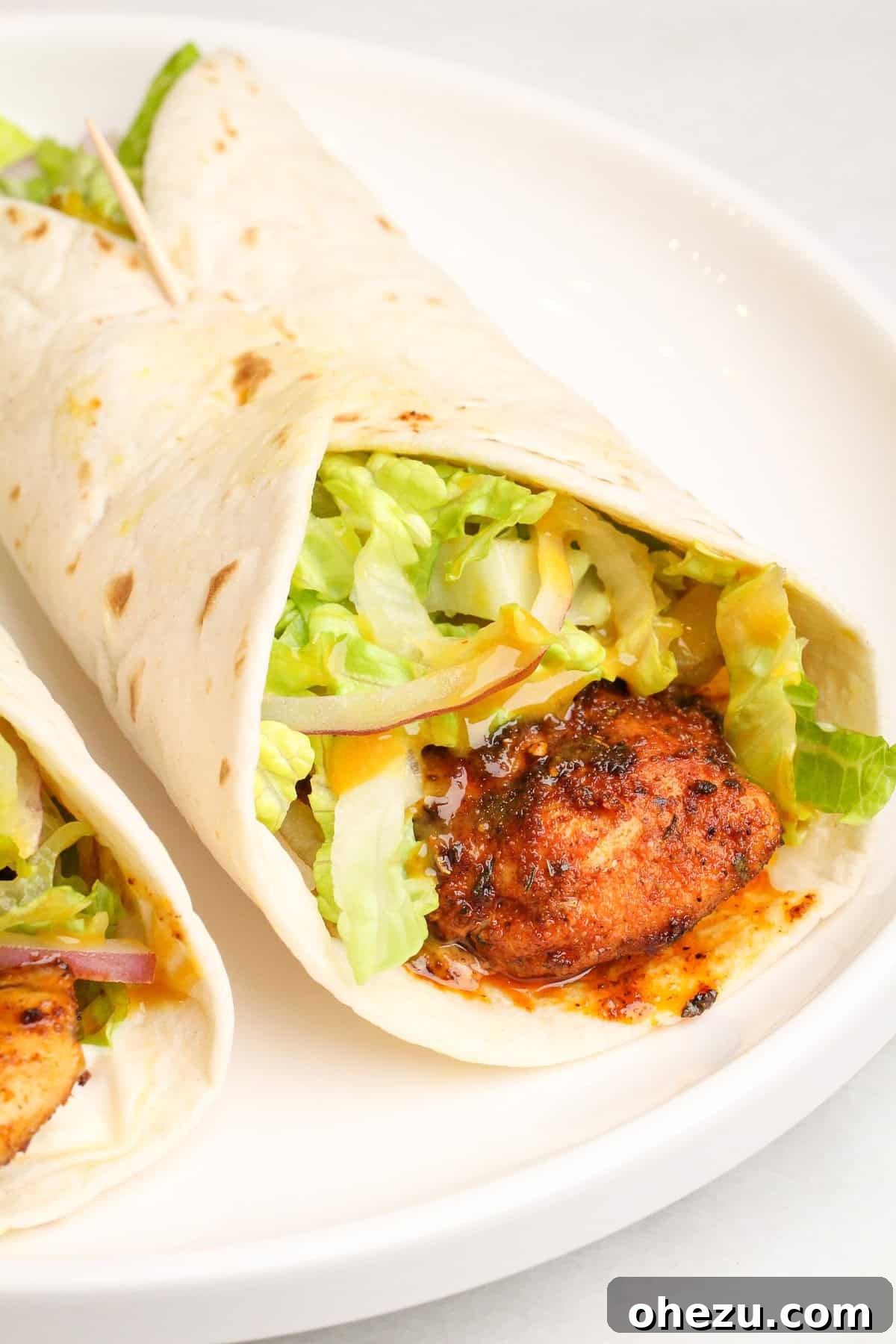 Cajun Chicken Wraps 5 Cooked blackened chicken tenders seasoned with Cajun spices