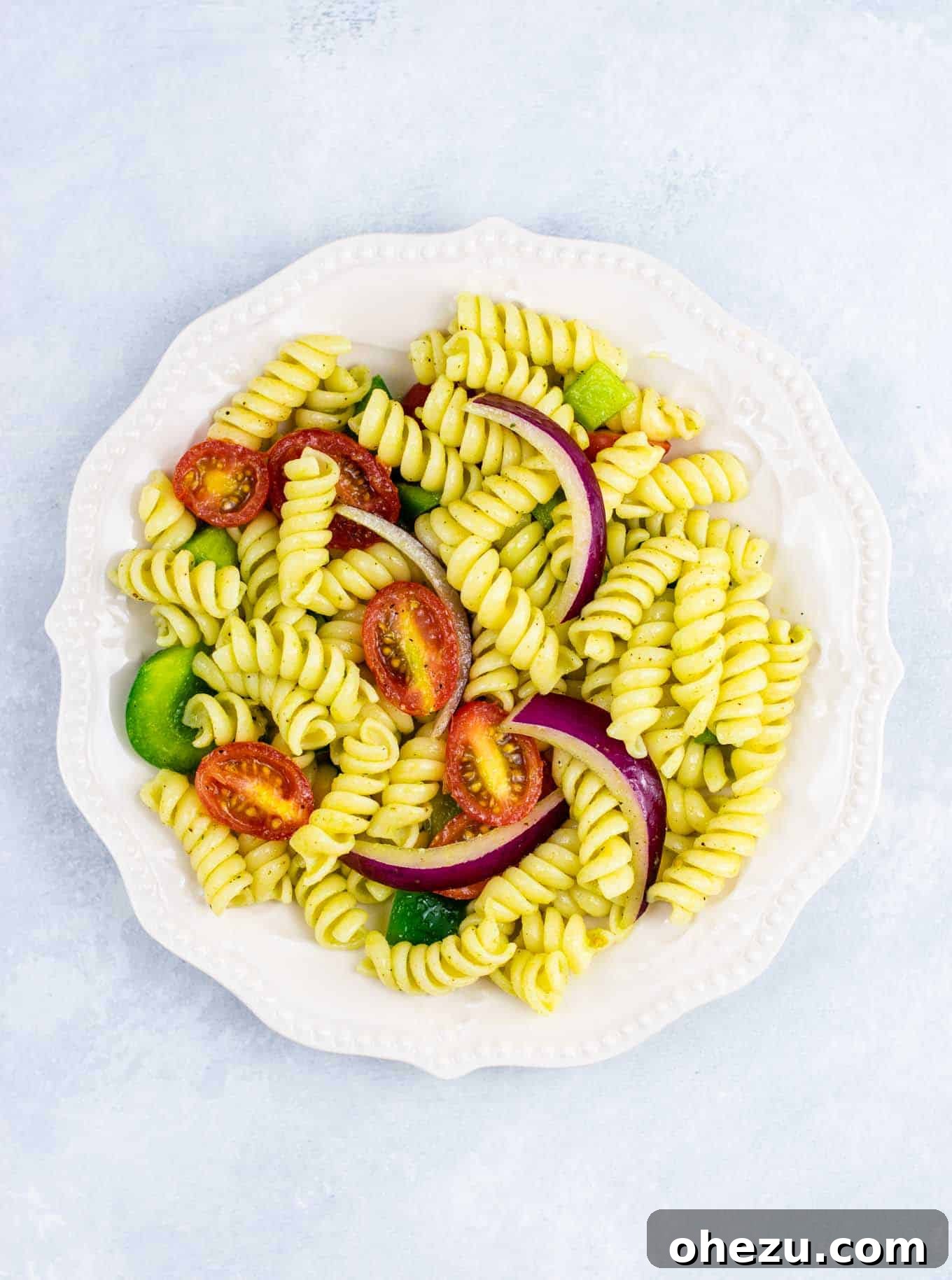 Vegan cold pasta salad recipe – this was AMAZING! So much flavor and really easy to make. #vegan #pastasalad #vegetarian #sidedish #summer #meatless #dairyfree #healthyrecipe #veganpastasalad