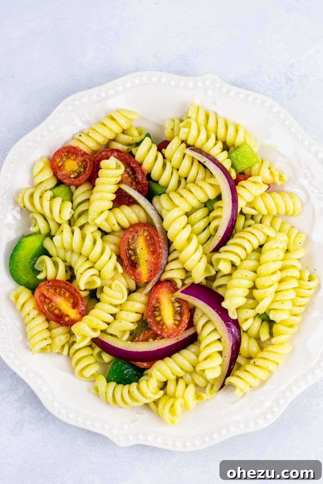 Vegan cold pasta salad recipe – this was AMAZING! So much flavor and really easy to make. #vegan #pastasalad #vegetarian #sidedish #summer #meatless #dairyfree #healthyrecipe #veganpastasalad