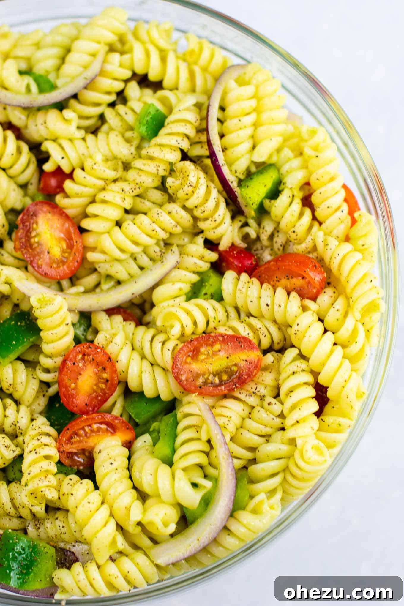 Vegan pasta salad recipes – this was AMAZING! So much flavor and really easy to make. #vegan #pastasalad #vegetarian #sidedish #summer #meatless #dairyfree #healthyrecipe #veganpastasalad