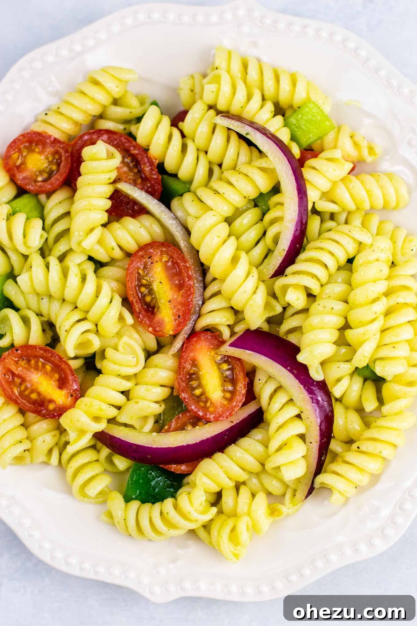 Vegan pasta salad recipes – this was AMAZING! So much flavor and really easy to make. #vegan #pastasalad #vegetarian #sidedish #summer #meatless #dairyfree #healthyrecipe #veganpastasalad