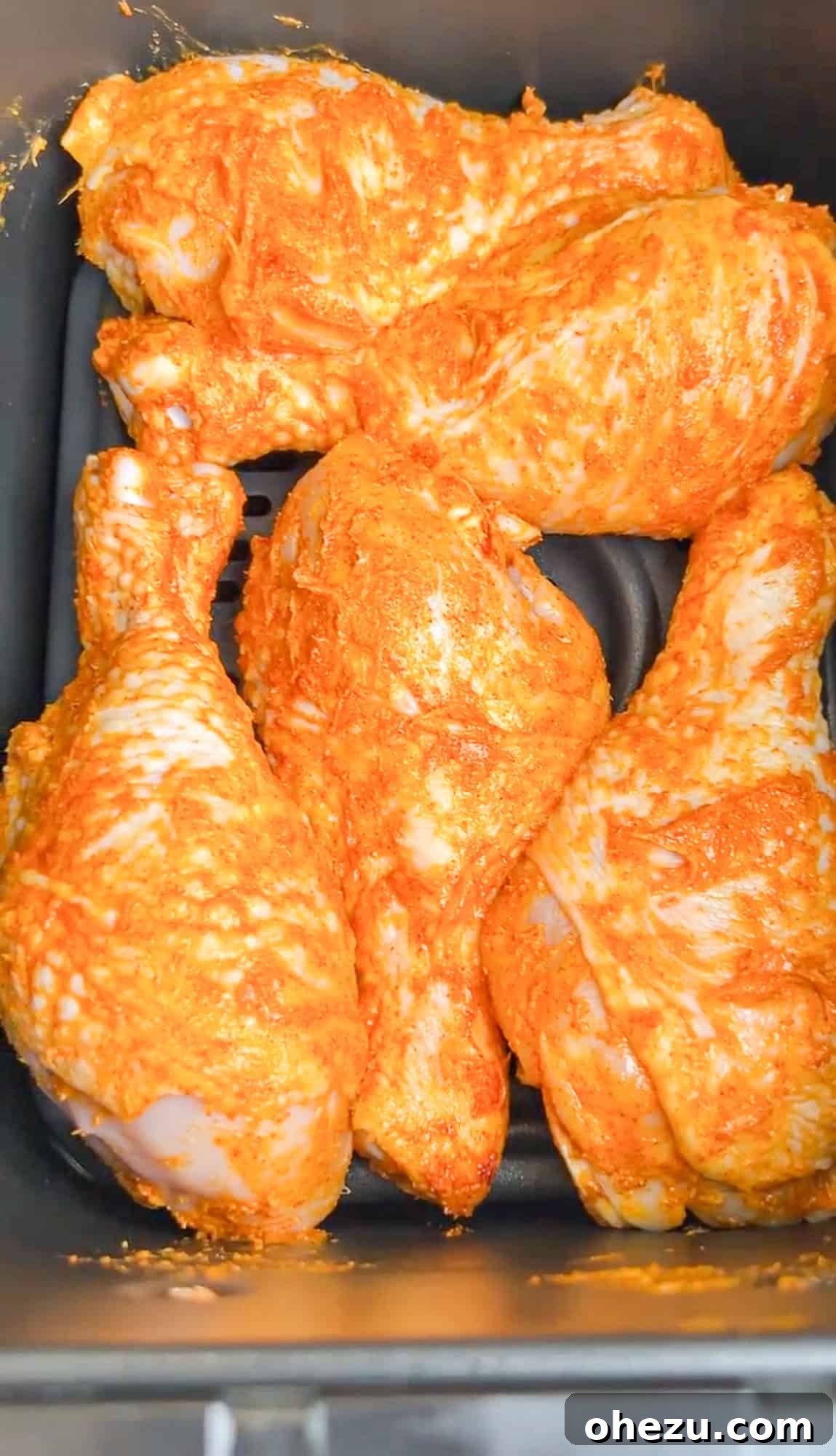 Crispy Air-Fried Sweet Chili Wings 7 Close-up of chicken wings fully coated with seasoning and crisping agents, ready for the air fryer.