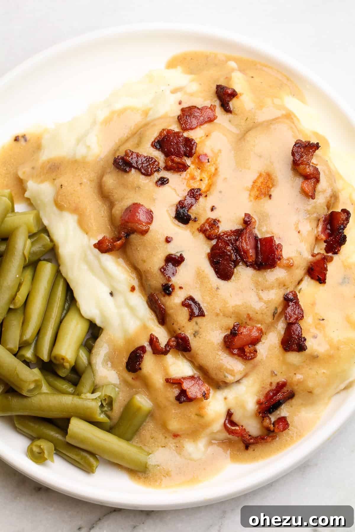 Soulful Southern Smothered Chicken 11 smothered chicken recipe served with mashed potatoes