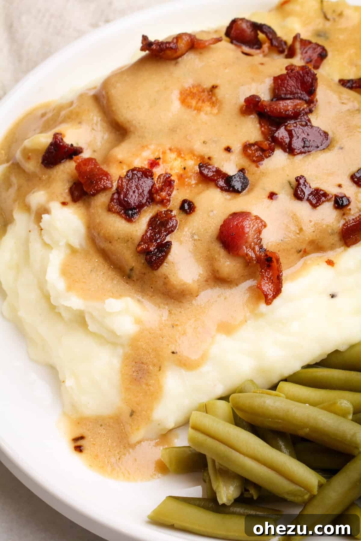Soulful Southern Smothered Chicken 3 smothered chicken recipe cooking in a skillet