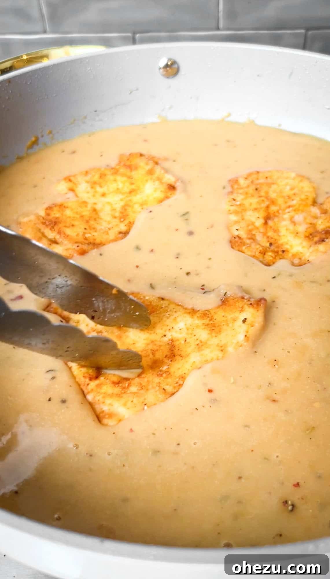 Soulful Southern Smothered Chicken 10 smothered chicken recipe simmering in gravy