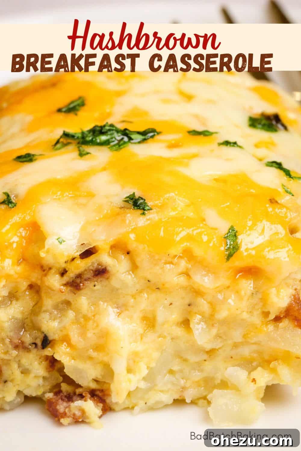 Close-up of a golden brown breakfast casserole with hashbrowns and melted cheese