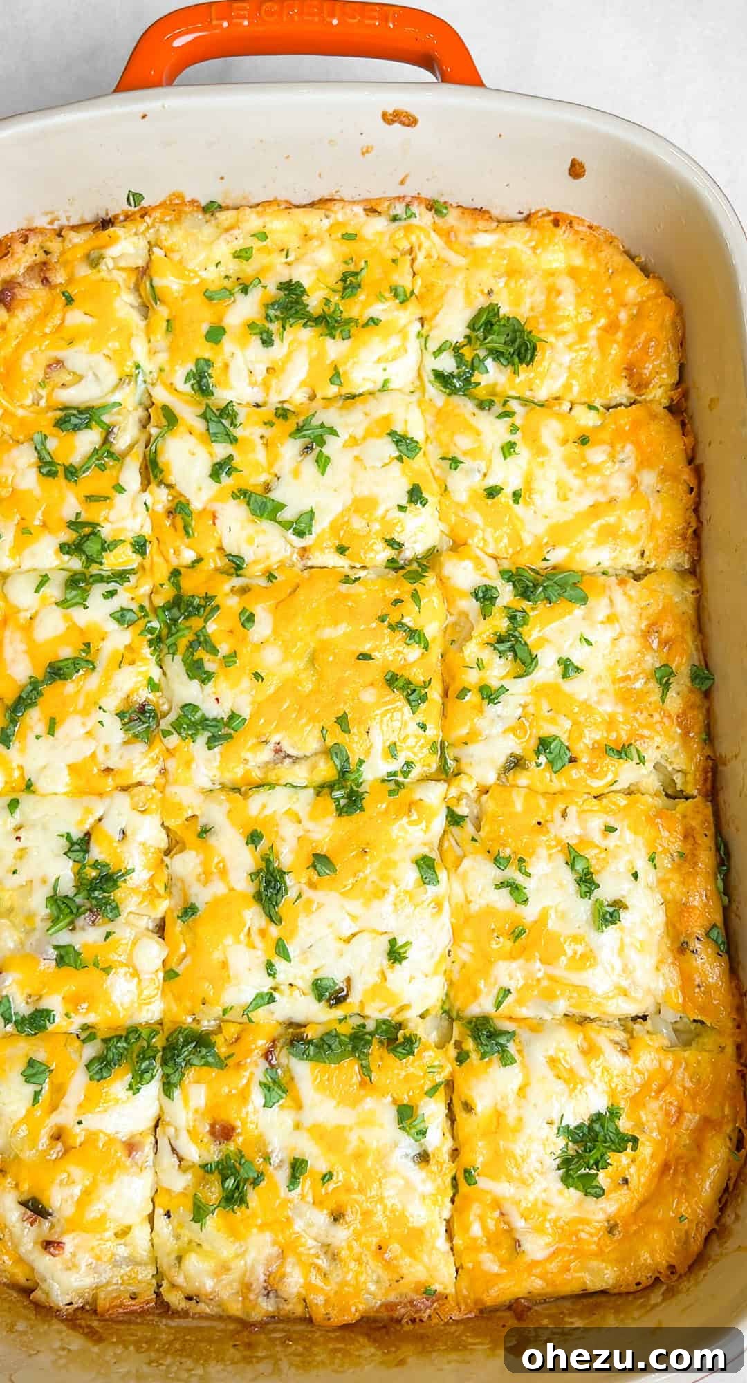 Baked breakfast casserole with hashbrowns, golden brown and bubbly
