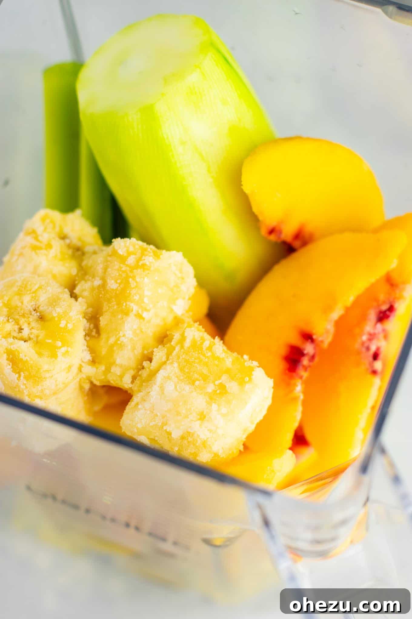 A healthy and vibrant pineapple detox smoothie in a clear glass