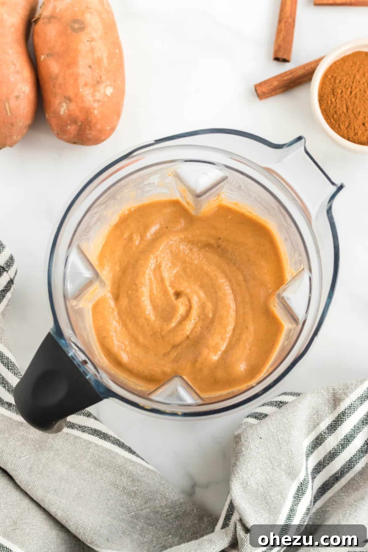 Wholesome Sweet Potato Bliss 6 blender with smoothie in it