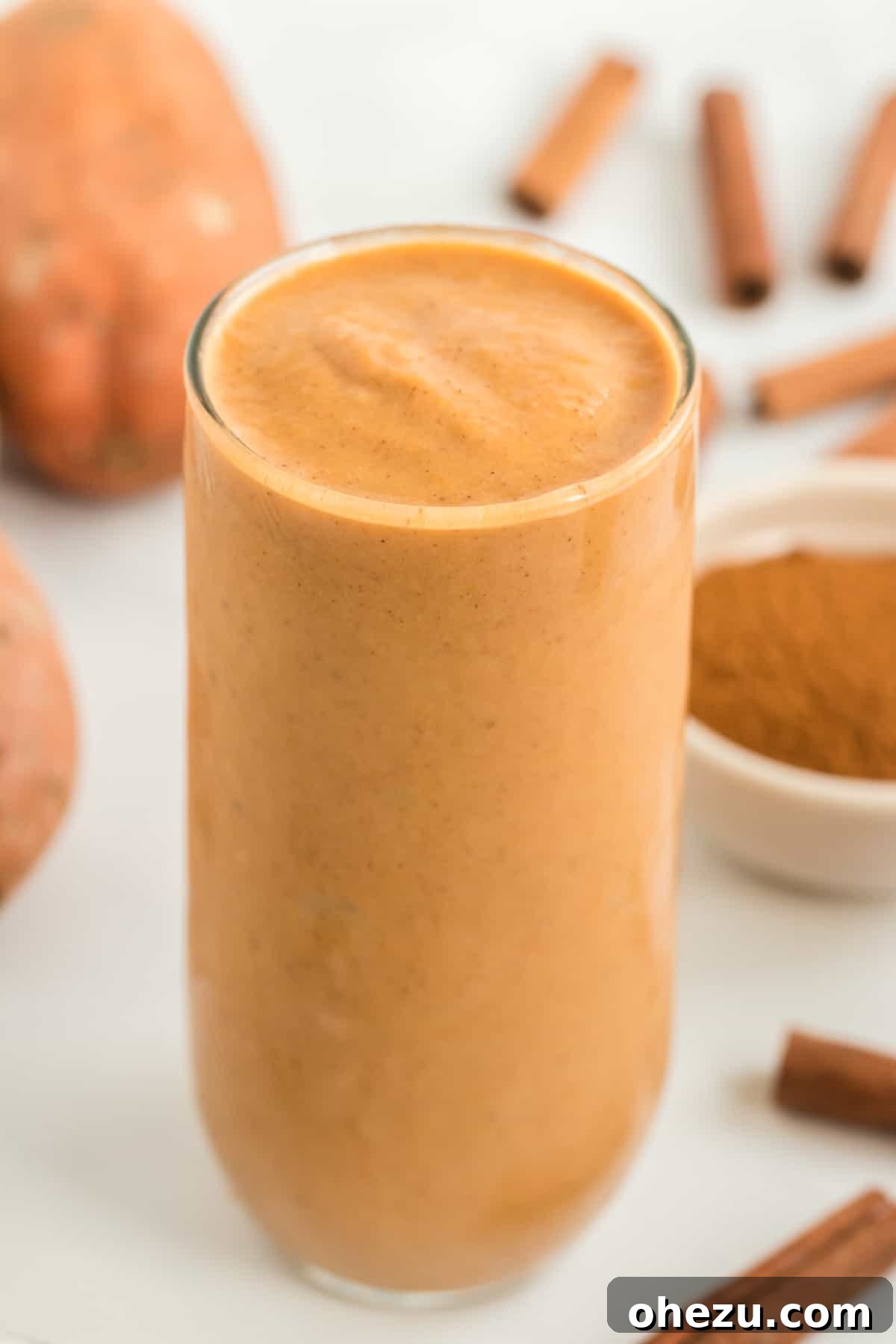 Wholesome Sweet Potato Bliss 8 tall glass filled with sweet potato smoothie