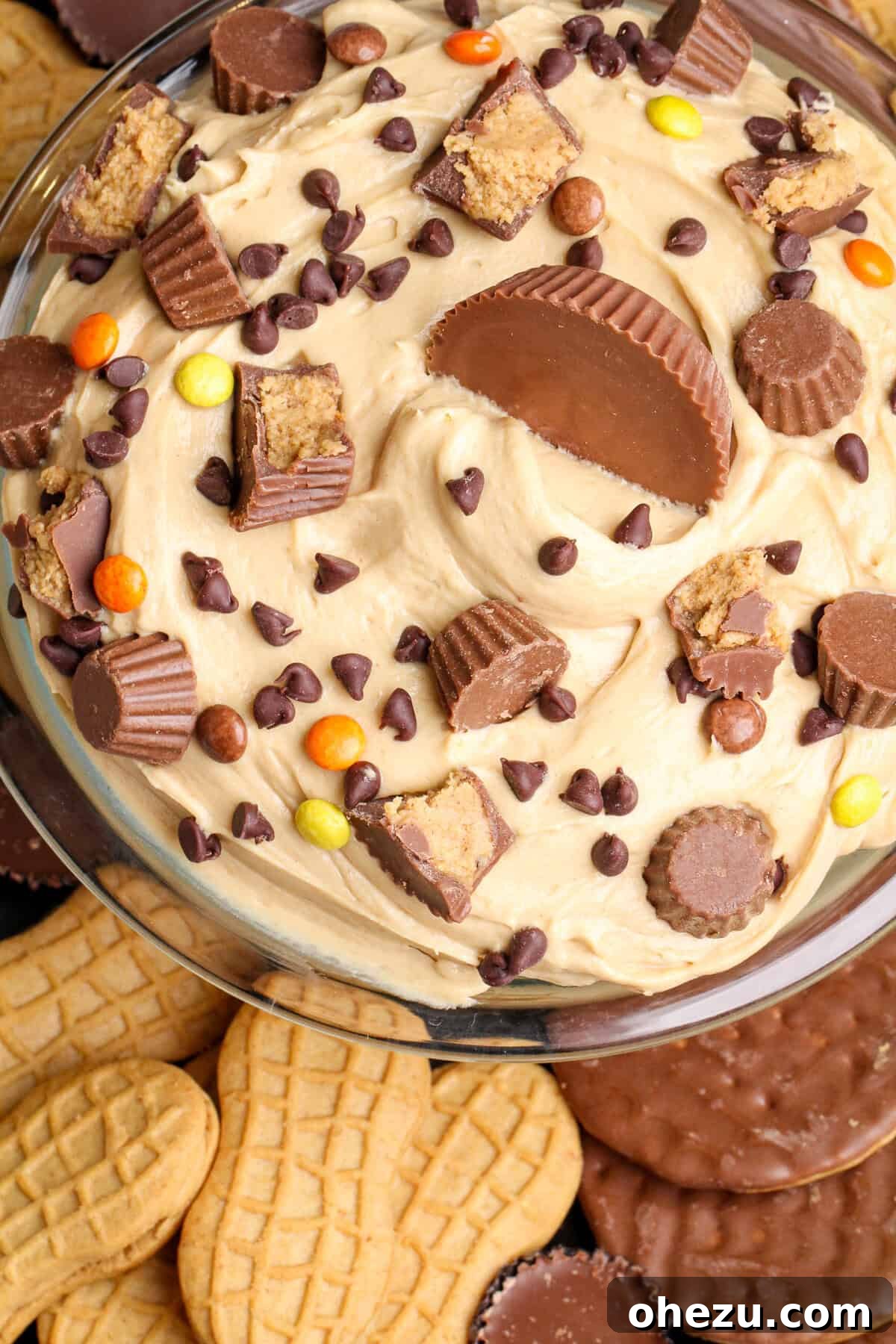 Peanut Butter Cheesecake Dip with Chocolate Chips and Reese's candies
