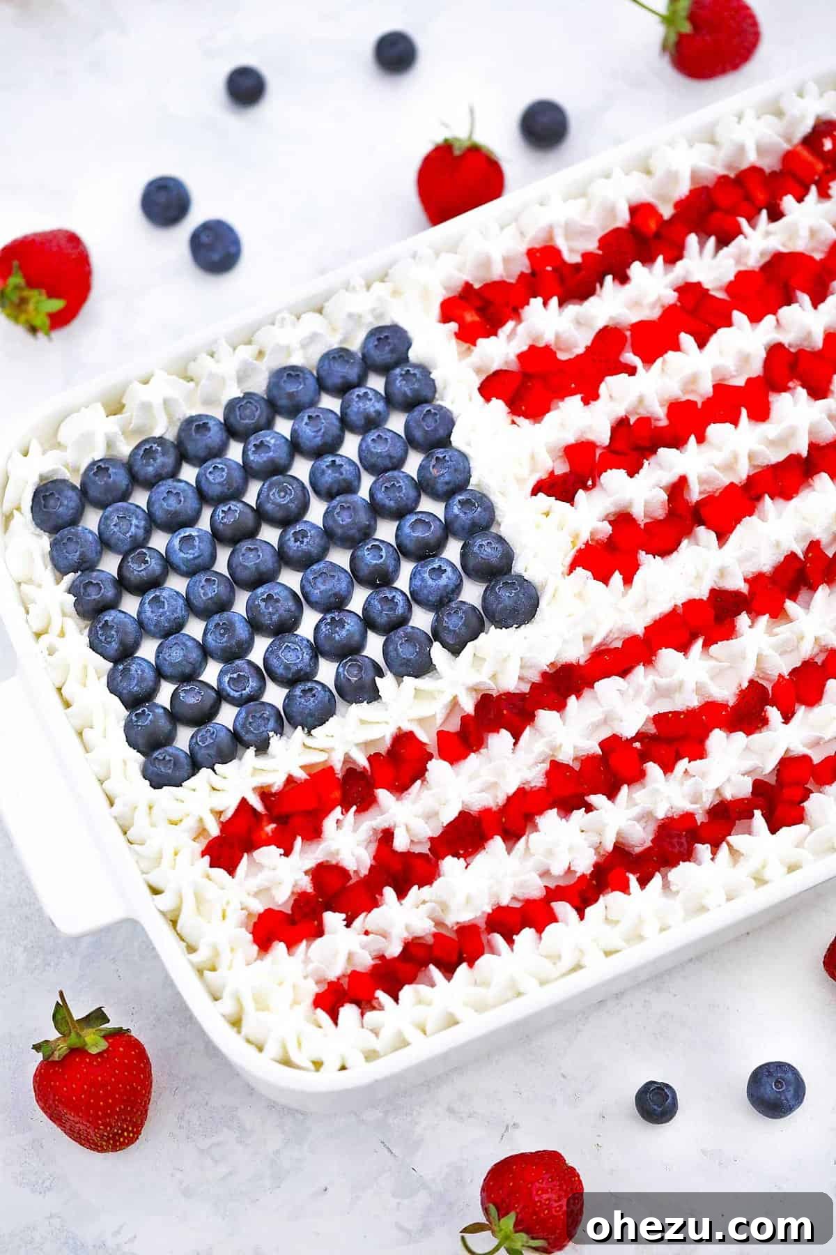 Patriotic Red White and Blue Poke Cake, ideal dessert for 4th of July and Memorial Day